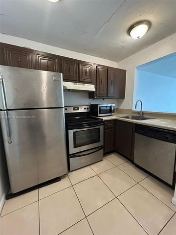 496 NW 165th St Rd D-310, Miami, FL 33169