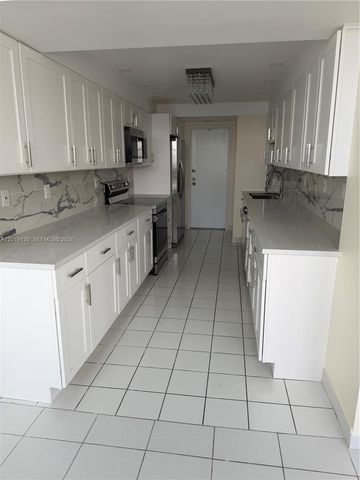 100 Golden Isles Dr 313, Hallandale Beach, FL 33009