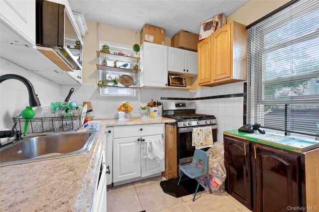 31-29 100th Street, Corona, NY 11368