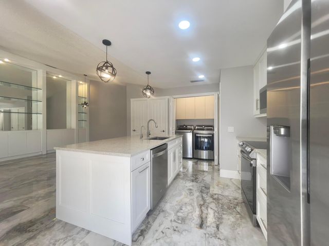 6503 Geminata Oak Court, Palm Beach Gardens, FL 33410