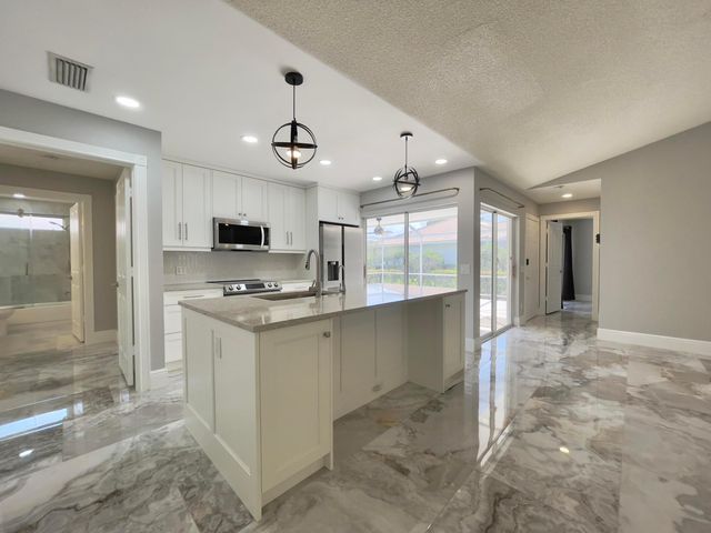 6503 Geminata Oak Court, Palm Beach Gardens, FL 33410