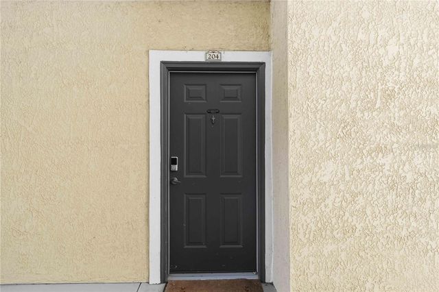 10201 COURTNEY PALMS BOULEVARD 204, Tampa, FL 33619