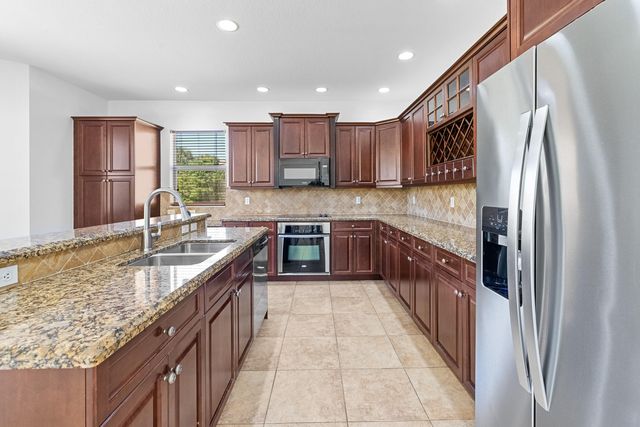 2705 Pienza Circle, Royal Palm Beach, FL 33411