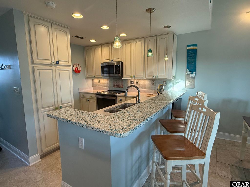 Image 16 of property listing at 125 Pirates Way Unit# 125D, Manteo, NC 27954