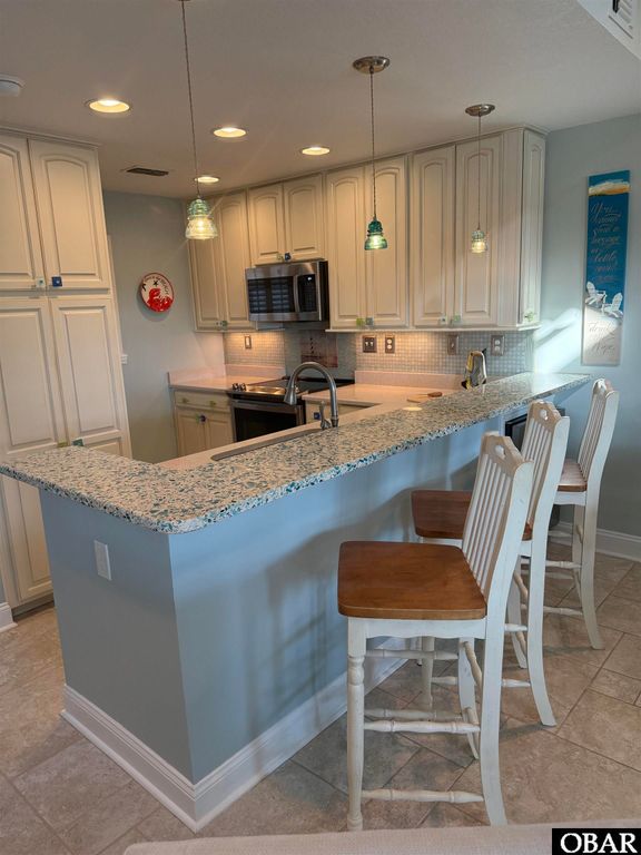 Image 17 of property listing at 125 Pirates Way Unit# 125D, Manteo, NC 27954