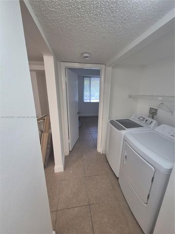 831 Lyons Road 23203, Coconut Creek, FL 33063