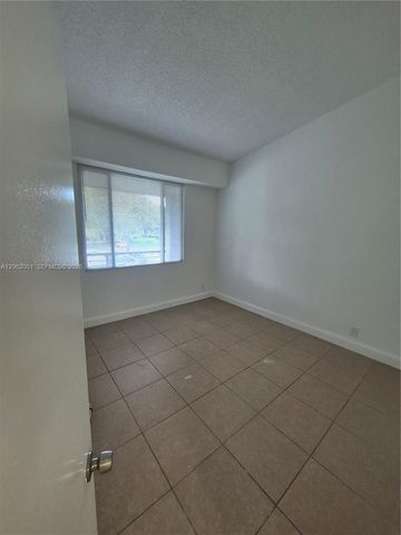 831 Lyons Road 23203, Coconut Creek, FL 33063