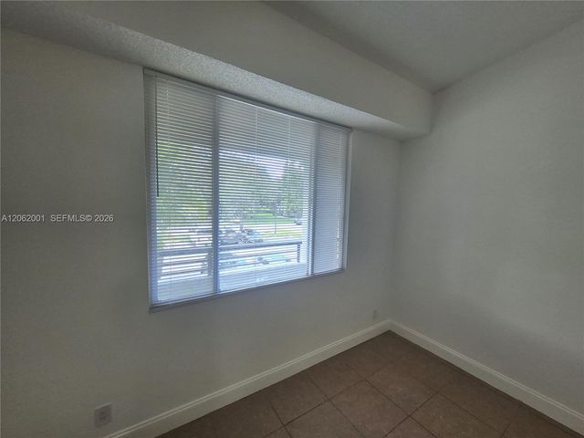 831 Lyons Road 23203, Coconut Creek, FL 33063