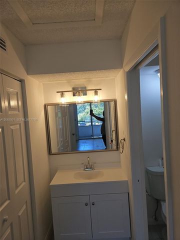 831 Lyons Road 23203, Coconut Creek, FL 33063