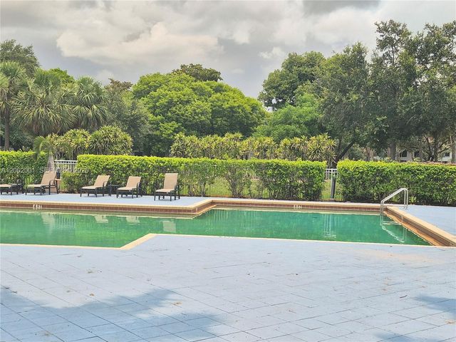 831 Lyons Road 23203, Coconut Creek, FL 33063