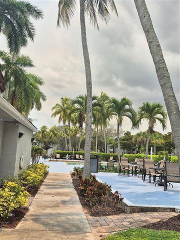 831 Lyons Road 23203, Coconut Creek, FL 33063