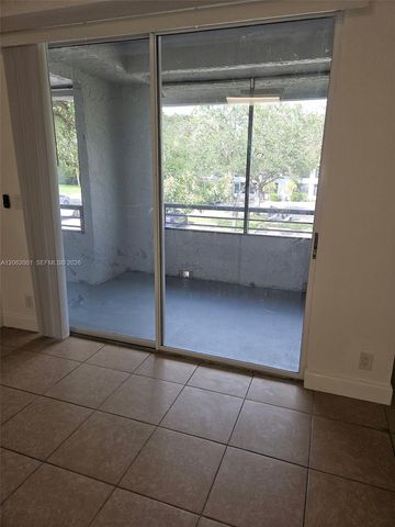 831 Lyons Road 23203, Coconut Creek, FL 33063