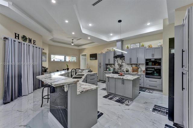 13085 N 78th Place N, Palm Beach, FL 33412