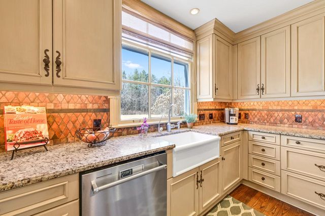 705 W Bradley ROAD, River Hills, WI 53217