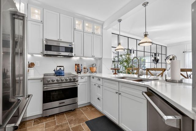 100 Uno Lago Drive 103, Juno Beach, FL 33408