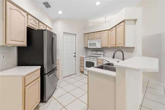 100 MORNING GLORY CIRCLE, Winter Haven, FL 33884