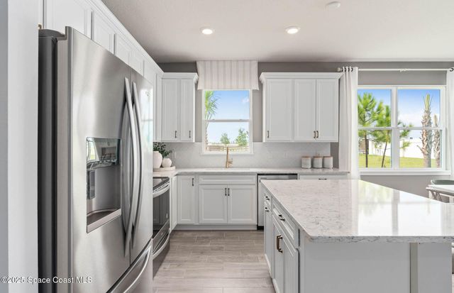 9043 Blissful Breeze Trail, Melbourne, FL 32940