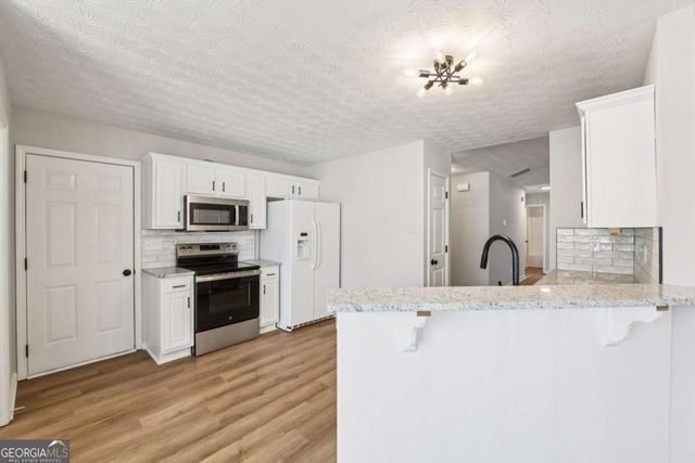 7091 Greenridge Drive, Loganville, GA 30052