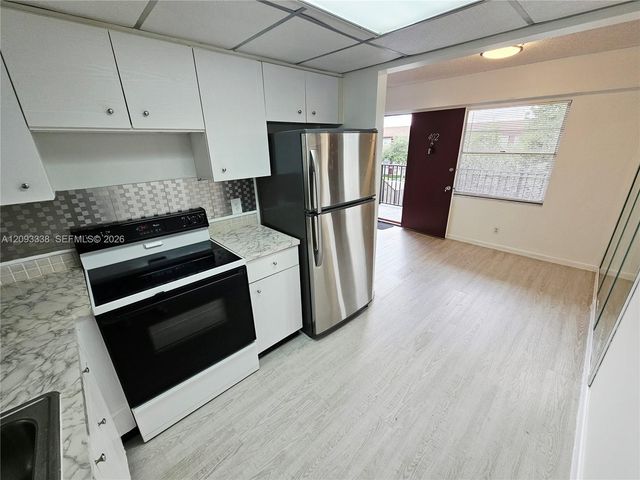13250 SW 7th Court 402L, Pembroke Pines, FL 33027