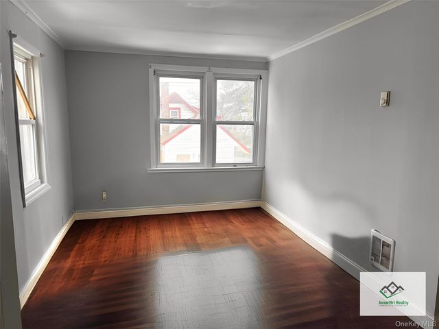 21 E Clinton Avenue, Roosevelt, NY 11575