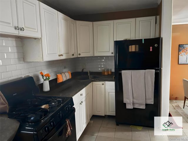 21 E Clinton Avenue, Roosevelt, NY 11575