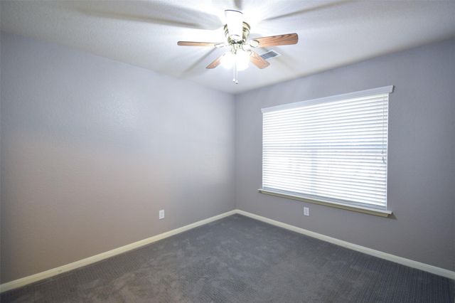 31 Rolling Ridge Court, Conroe, TX 77385