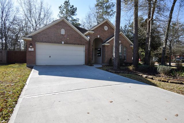 31 Rolling Ridge Court, Conroe, TX 77385