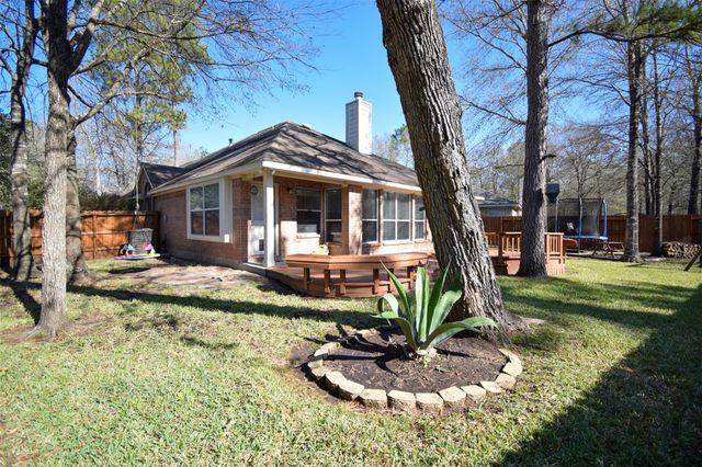 31 Rolling Ridge Court, Conroe, TX 77385