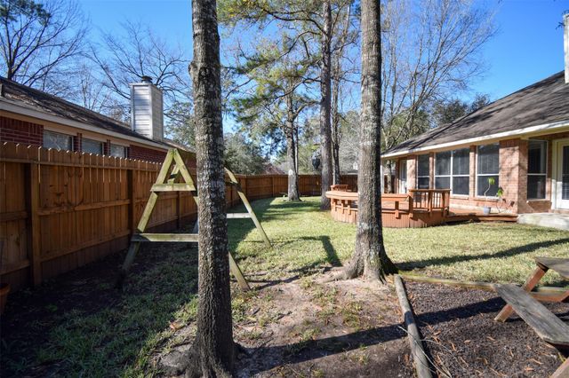 31 Rolling Ridge Court, Conroe, TX 77385