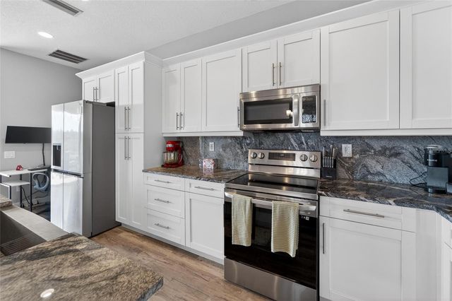 13701 CREST LAKE DRIVE, Hudson, FL 34669