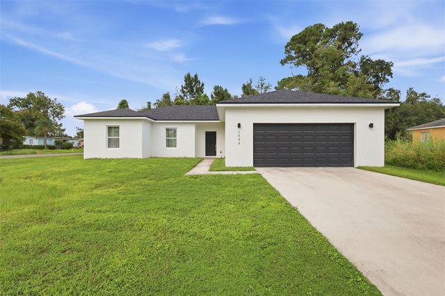 1523 ZINNIA DRIVE, Deltona, FL 32725