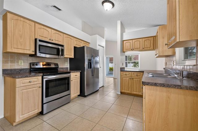 5910 BUTTON QUAIL COURT, Tampa, FL 33624