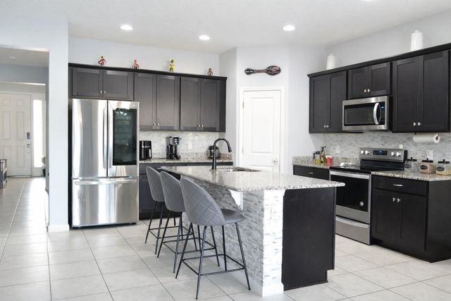 1058 WANDERER DRIVE, Deltona, FL 32738