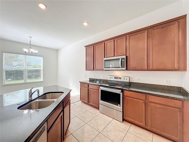 12989 WESTSIDE VILLAGE LOOP, Windermere, FL 34786