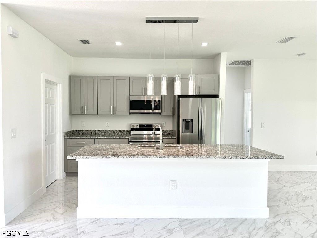 Image 7 of property listing at 2321 SW 21st TER, Cape Coral, FL 33991