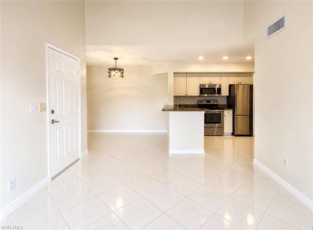 1265 Wildwood Lakes BLVD 201, Naples, FL 34104