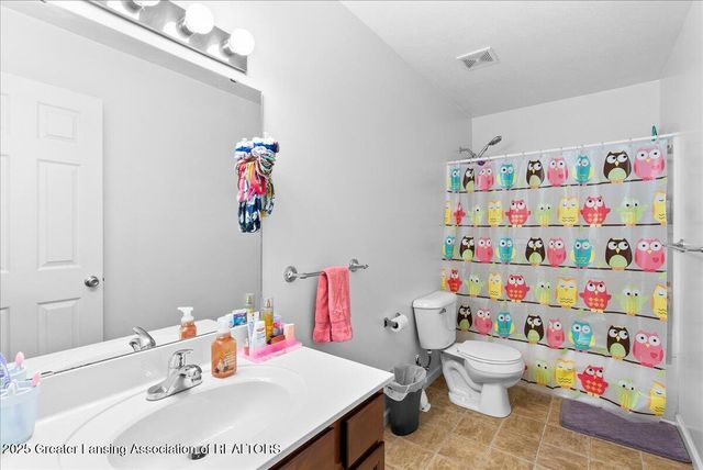 15080 Loxley Lane, Lansing, MI 48906