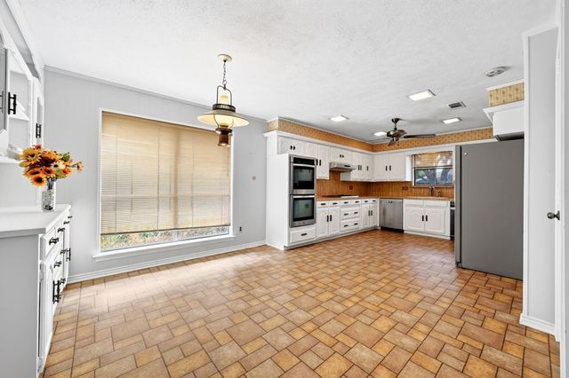 10130 Woodlake Drive, Dallas, TX 75243