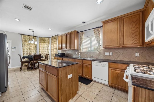 21702 Cozy Hollow Lane, Richmond, TX 77469