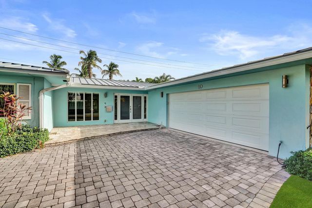 10 Minnetonka Road, Sea Ranch Lakes, FL 33308