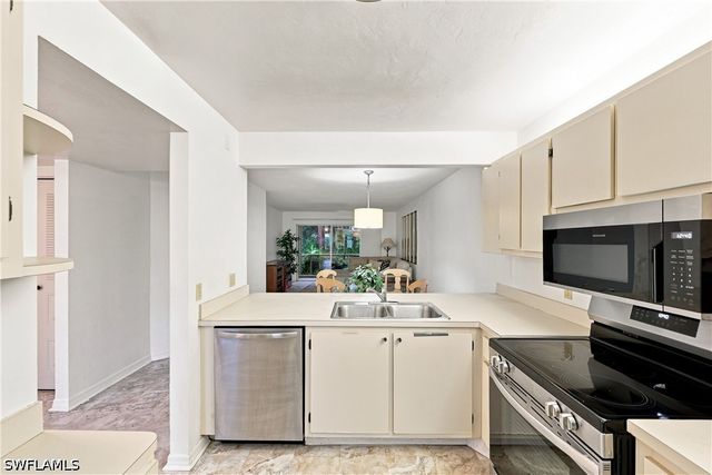 2612 Kings Lake BLVD 2-103, Naples, FL 34112