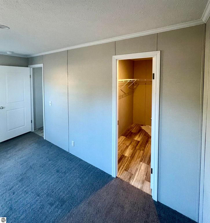 Image 11 of property listing at 8716 Johnson Road, Bellaire, MI 49615