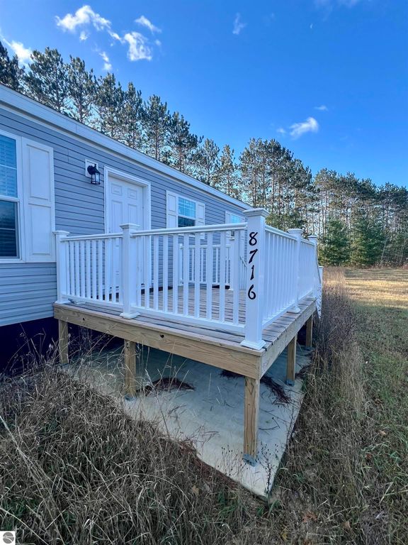 Image 2 of property listing at 8716 Johnson Road, Bellaire, MI 49615