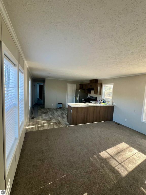 Image 5 of property listing at 8716 Johnson Road, Bellaire, MI 49615