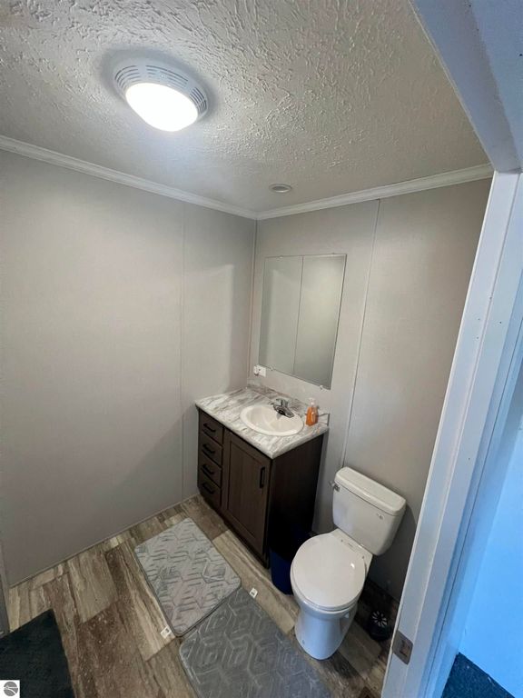 Image 7 of property listing at 8716 Johnson Road, Bellaire, MI 49615