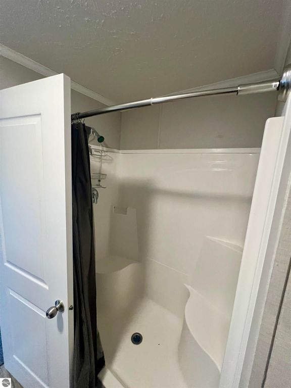 Image 8 of property listing at 8716 Johnson Road, Bellaire, MI 49615