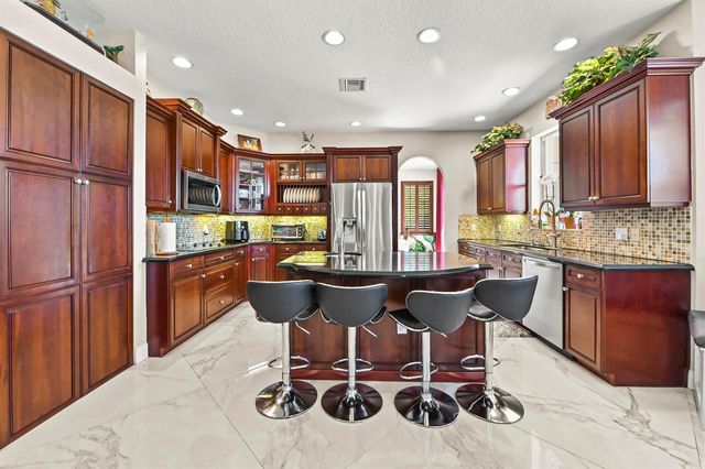 9133 Delemar Court, Wellington, FL 33414