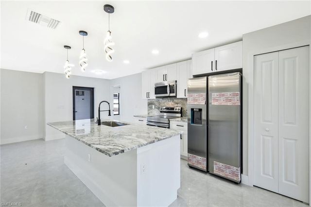 3411 27th ST SW, Lehigh Acres, FL 33976