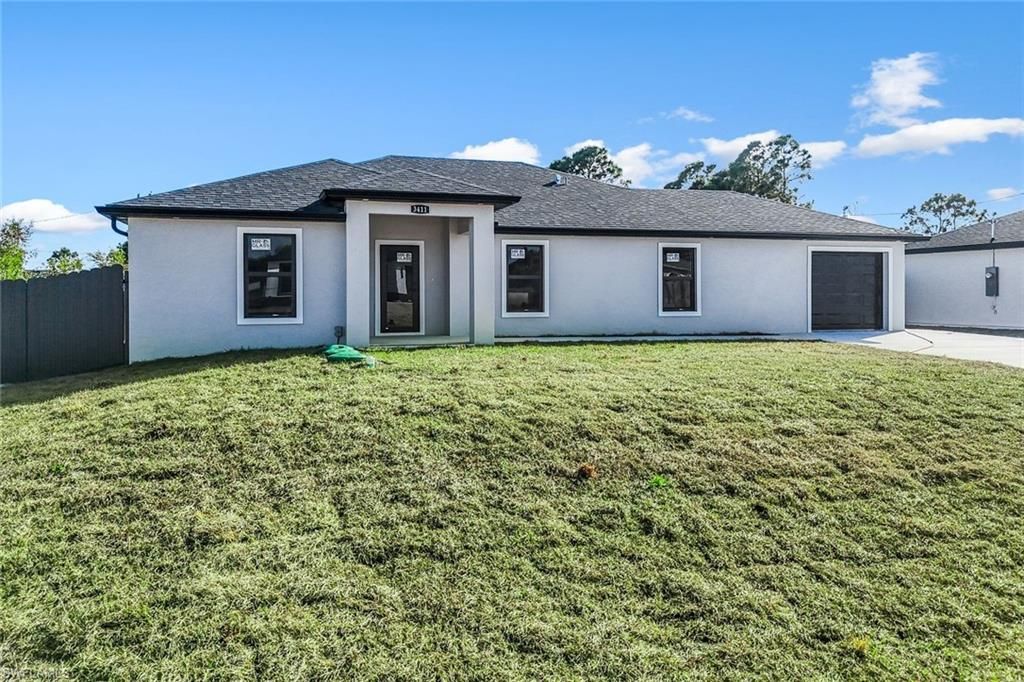 3411 27th ST SW, Lehigh Acres, FL 33976