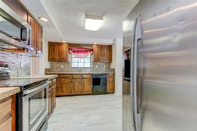 10406 RECLINATA LANE, Tampa, FL 33618